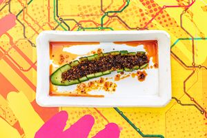 Chilli Cucumber - pickled cucumber topped with crunchy garlic chilli oil. at Susuru Ramen & Gyoza in Newcastle