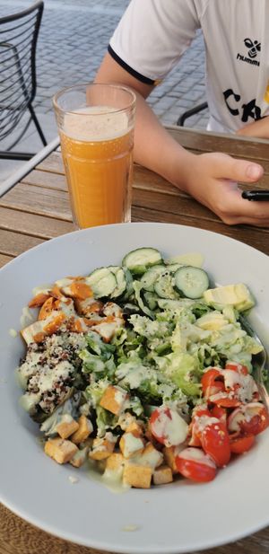 Make your own salad (Quinoa, mixed salad, avocado, sweet potato, tofu, cucumber, tomato and avocado dressing) and a citrus juice at Naturo Healthy Food in Sibiu