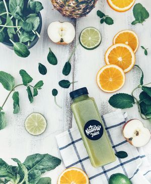 orange. apple. pineapple. spinach. mint. lime. at Naturo Healthy Food in Sibiu