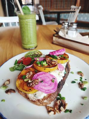 Vegan toast with violife cream cheese, baked pumpkin, pink beetroot, chives and walnuts at Strh Cafe & Gallery in Zakopane