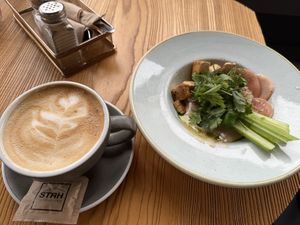 Cap with oat milk, vegan protein bowl  at Strh Cafe & Gallery in Zakopane