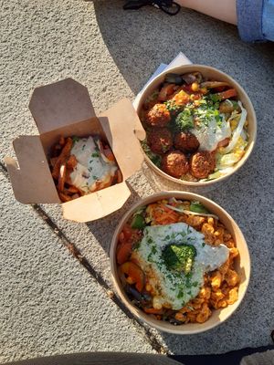 Sweet potato fries, falafel plate, seitan plate at Veggie Liebe in Freiburg