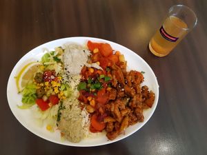 Seitan plate and homemade chia seed ice tea at Veggie Liebe in Freiburg