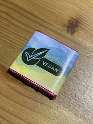 Coffee served with a lovely little chocolate   at Vegan Cafe in Dnipropetrovsk