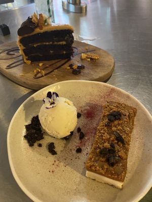 Biscoff cheesecake and chocolate caramel with honeycomb cake  at Unity Diner in East London