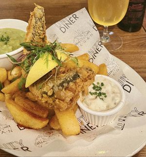 Tofish & chips with mushy peas and a cider  at Unity Diner in East London