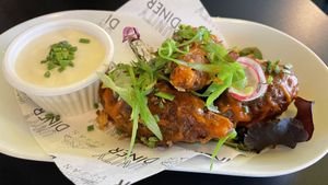 Drumsticks & Frank’s hot sauce  at Unity Diner in East London