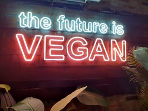 Awesome big neon sign as soon as you go in at Unity Diner in East London