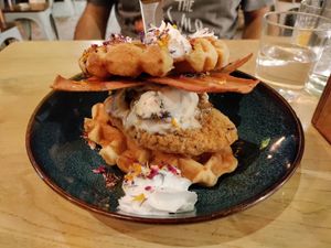 Waffles with chikin and salty bacon to balance out the sweetness at Unity Diner in East London