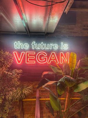 A sign   at Unity Diner in East London