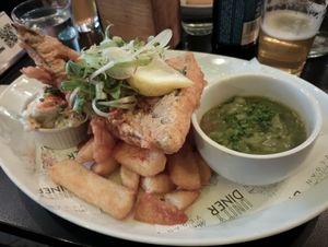 Tofish and chips, which come with tartar sauce and mushy peas. at Unity Diner in East London