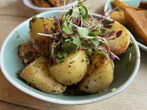Chimichurri new potatoes  at Unity Diner in East London