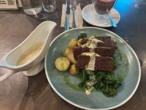Steak with veg and peppercorn sauce  at Unity Diner in East London