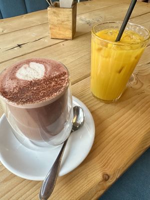 Red velvet latte and mango orange juice   at Unity Diner in East London