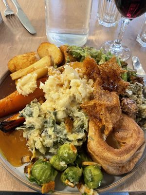 Sunday roast with glass of Merlot   at Unity Diner in East London