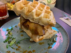 Chicken and Waffles. Ask for extra maple syrup and drown it! :) at Unity Diner in East London