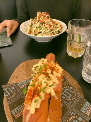 Supreme Dog and Chikken Caesar Salad with Bakon at Unity Diner in East London