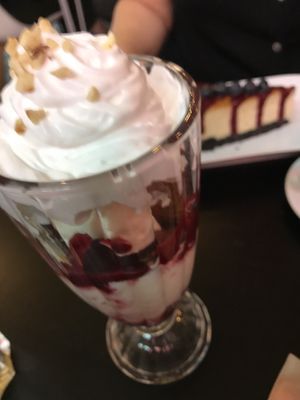 Peanut Butter and Jam Sundae and Cheesecake in the background  at Unity Diner in East London