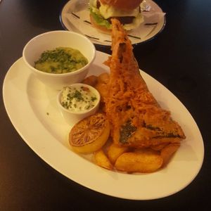 Tofish and chips complete with tartare sauce and mushy peas at Unity Diner in East London