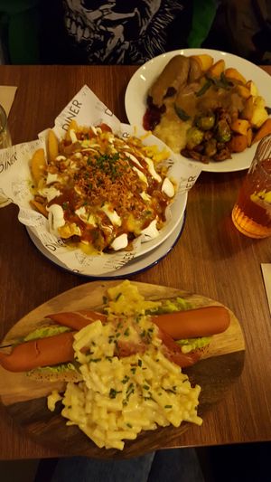 hotdog with mac&cheese, dirty loaded fries, christmas roast at Unity Diner in East London