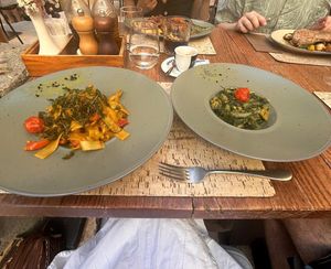 Green tagliatelle with julienned vegetables (left) with a side of Swiss chard and potatoes (right) at Groppo in Zadar