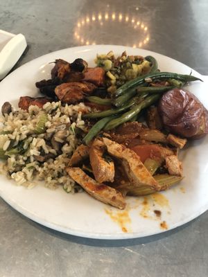 Plate of hot bar food from the Marketplace at Zinc Cafe and Market in Los Angeles