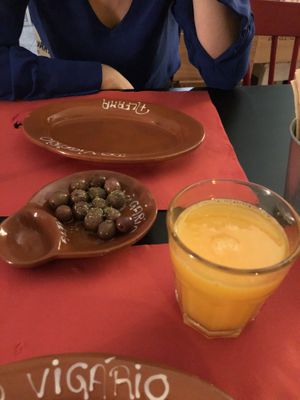 fresh OJ and olives   at Do Vigário Pub and Records in Lisbon