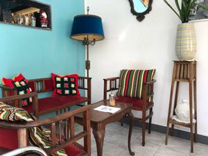 View into the cafe. at Do Vigário Pub and Records in Lisbon