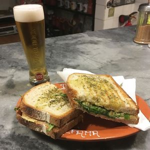 Hummus and Rocket Toast at Do Vigário Pub and Records in Lisbon