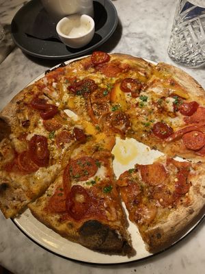 Vegan Forza. Couldn’t resist taking a bite before pic!  at Pizza Express - St Helier in Jersey