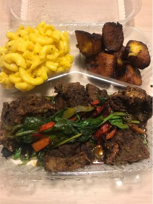 Crispy portobello mushrooms with Mac and cheese and plantains at Senbeb Cafe in Washington
