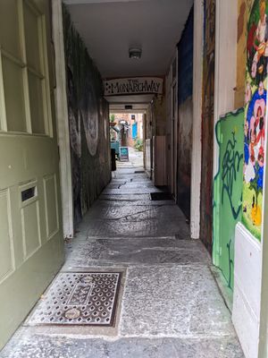 The passage entrance from high street at Pyramid Vegan Cafe & Bakery in Glastonbury