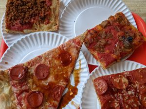 clockwise, starting from the right top corner: 'vegan vidalia', 'vegan hellboy squared', 'vegan hellboy', 'vegan Freddy' at Paulie Gee's - Slice Shop in Brooklyn