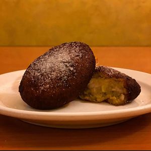 Vegan Plantain Empanadas with a Custard like filling. at Fernanda's Salvadorian in Cathedral City