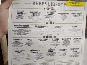 Vegetarian / vegan options are marked on the menu at HKG - Beef & Liberty Burgers - T1 in Outlying Islands