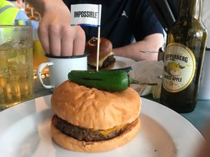 Not a good photo as I started eating haha but this impossible burger was 10/10. Probably one of the best vegan burgers I’ve ever had.  at HKG - Beef & Liberty Burgers - T1 in Outlying Islands