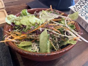 Organic side salad. There was a herb on here (I think oregano) that made this salad absolutely delicious.  at Kunda Vegan Vegetarian in Chiang Rai