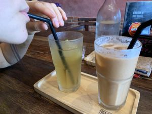 Dirty chai to the right  at Kunda Vegan Vegetarian in Chiang Rai