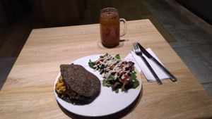 This is the "Arepa Negra". The salad was really good, as well. at Boho Balance by Silvana Gomez in Bogota