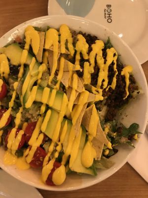 NACHO SALAD BOWL
lettuce, quinoa, taco crumble, tomate Cherry, Avocado, Totopos, Cheddar de Marañon.  at Boho Balance by Silvana Gomez in Bogota