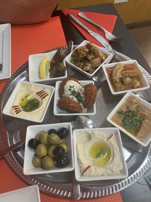 Mezze sharing platter (7/8 dishes vegan, asked to swap other  to olives)  at Middle East in Como