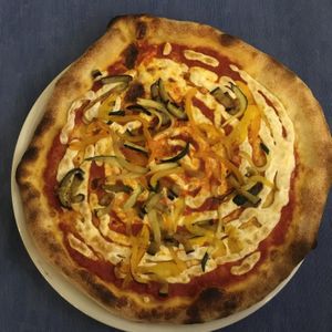 Pizza with vegan cheese and veggies  at Bahía Verde in Tenerife