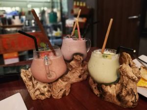 Smoothies in unique shape container at Double Durian - Lavender in Central Singapore