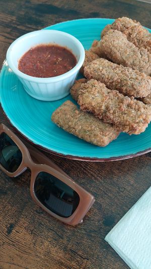 Sunglasses to show massive portion of cheese sticks. Homemade cheese and THE BEST breading! at Umami Gorilla in Wilkes-barre