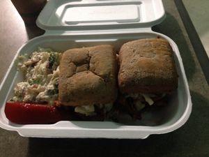 GF pulled pork sandwich with potato salad at Umami Gorilla in Wilkes-barre