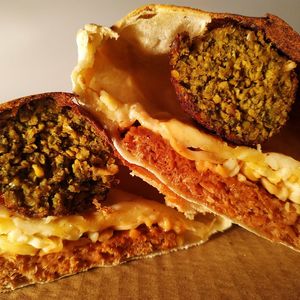 Новый Конвертик с растительной котлетой, веганским сыром и фалафелем.
New Envelope with plantbased cutlet, vegan cheese a at The Slice Pizza in Moscow