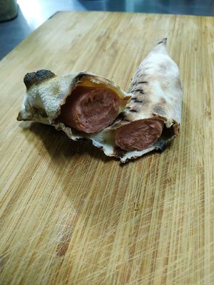 The tube with sausage.
Трубочка с сосиской. at The Slice Pizza in Moscow