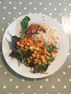 The Nut Burger (incredible!!!), chickpea salad and brown rice. at The Grove Veggie Kitchen in Limerick