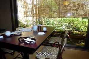 Table, chairs and beautiful gardens at Hachinoki at Hachinoki in Kamakura