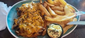 mushroom cheese Schnitzel and fries with garlic mayo at Apple & Eve in Hamburg